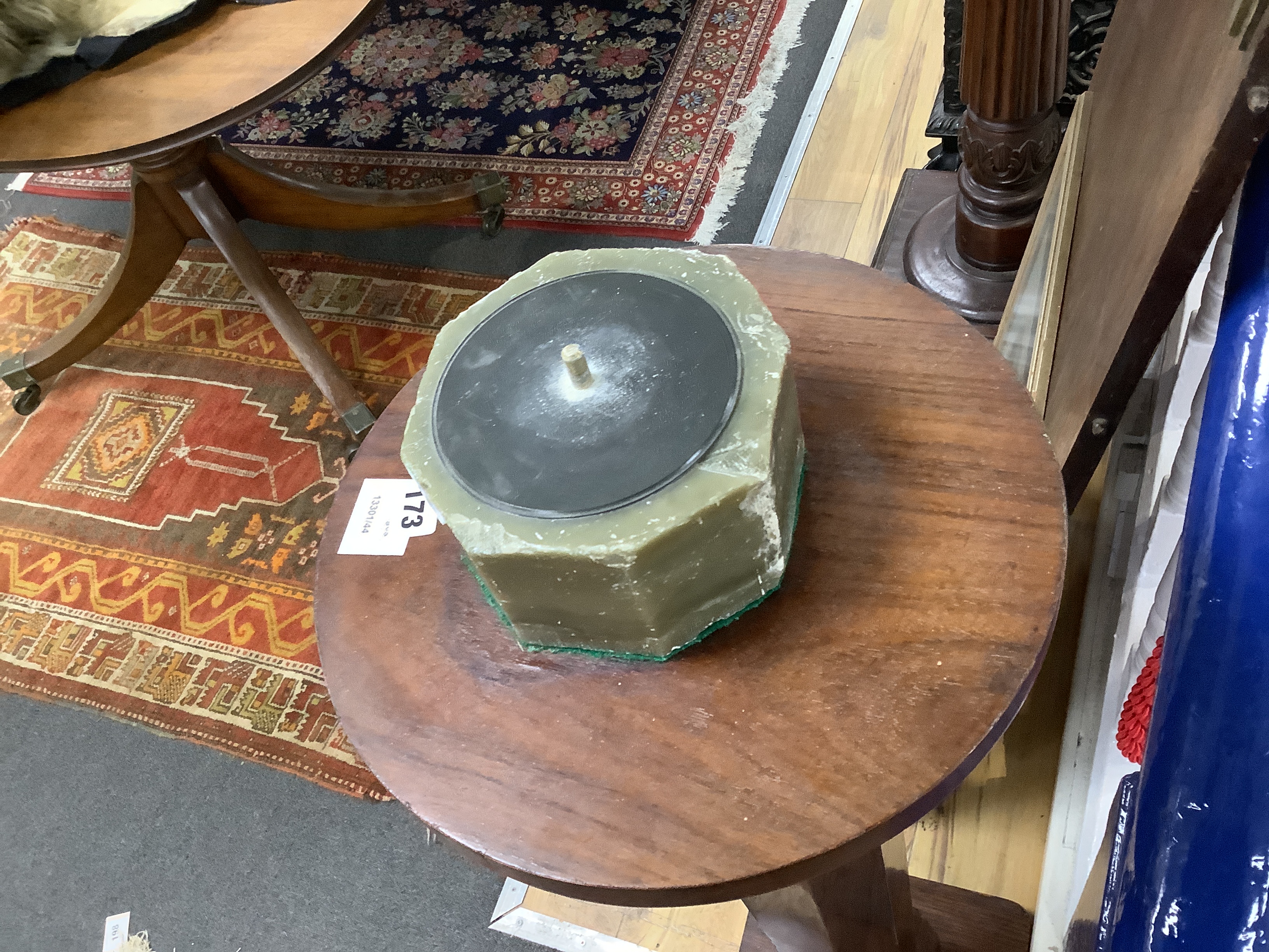 After the Antique, a carved marble bust of a young woman on octagonal onyx plinth and rosewood pedestal, combined height 142cm